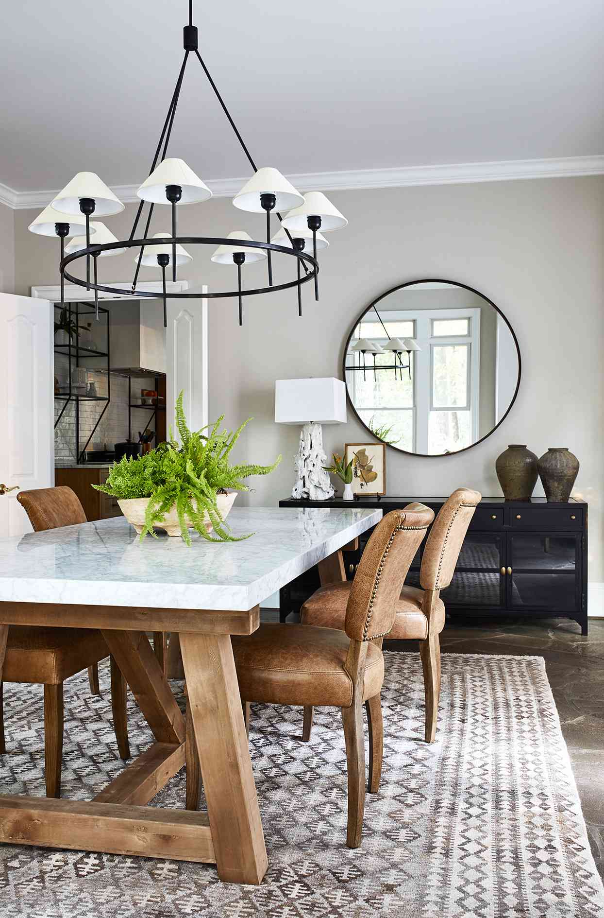 light colored dining room with black and brown accents