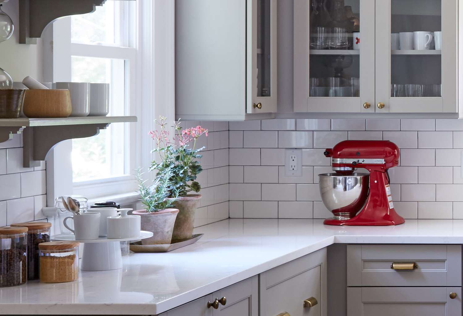 Kitchen island with red stand mixer