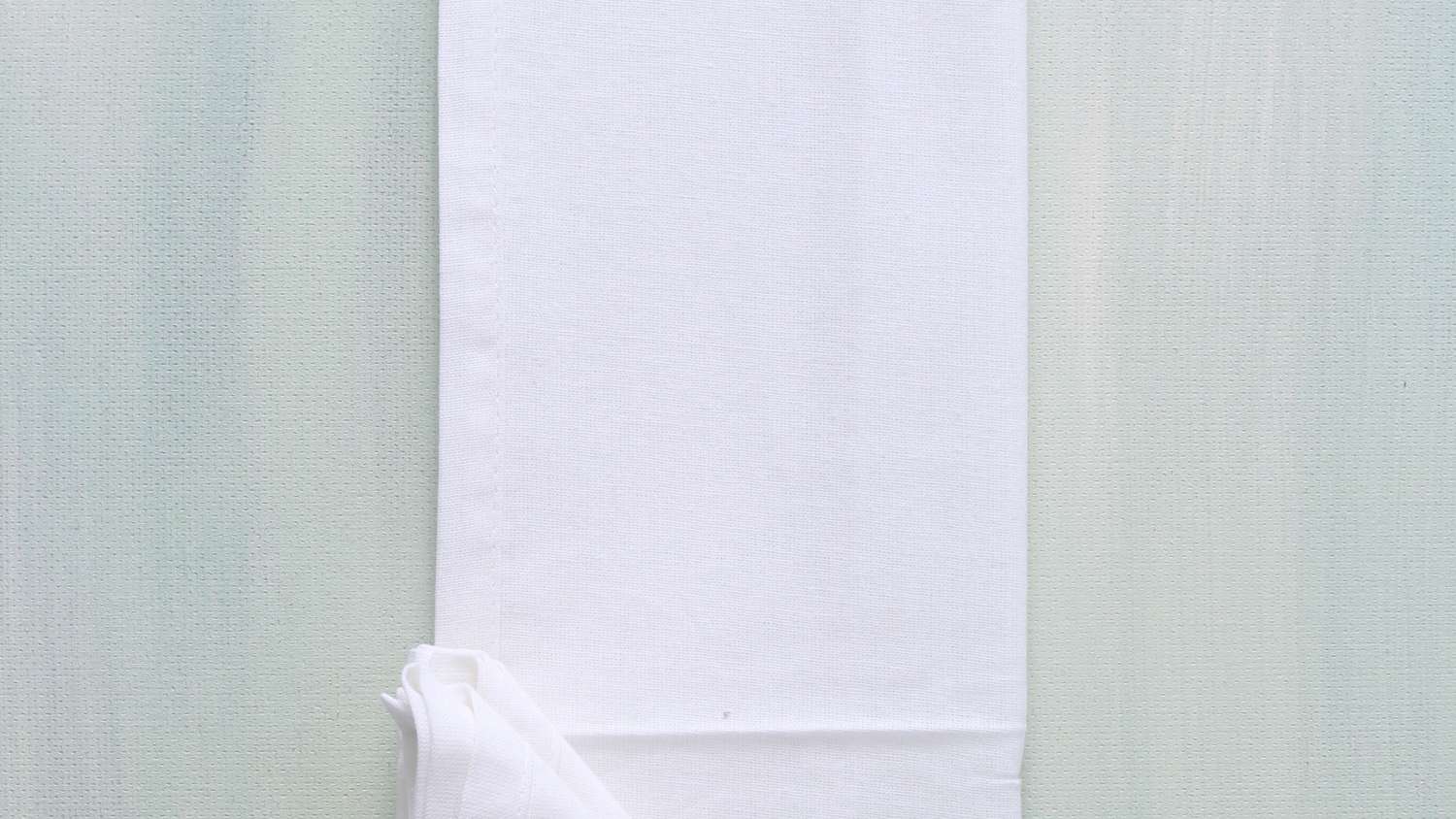 triangular fold started on lengthwise folded fabric