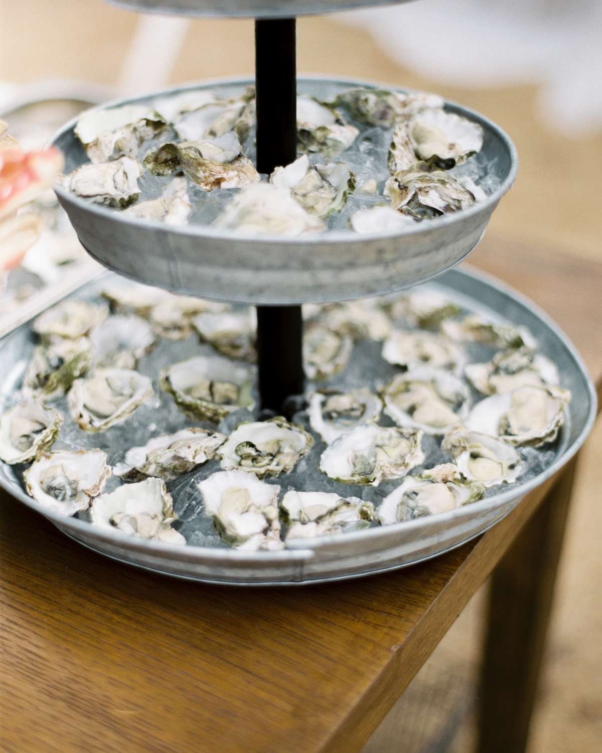 oysters presented on three-tier serving tray