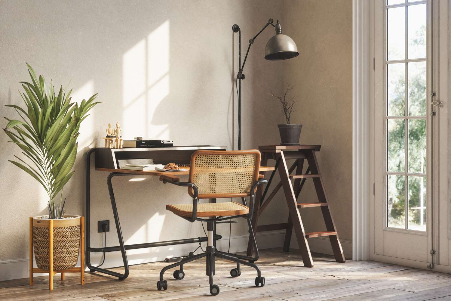 A home office setup with a desk a chair a laptop and a potted plant by a window