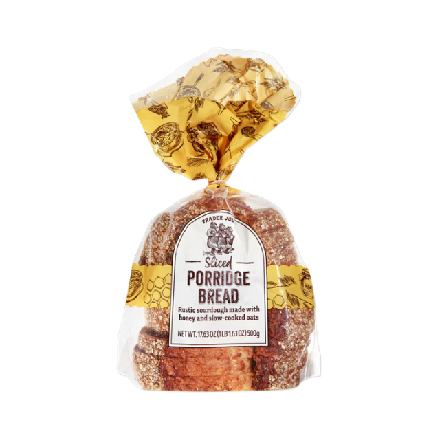 A packaged loaf of porridge bread labeled Trader Joes Porridge Bread with honey and slowcooked oats
