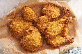 fried chicken on paper in a bowl