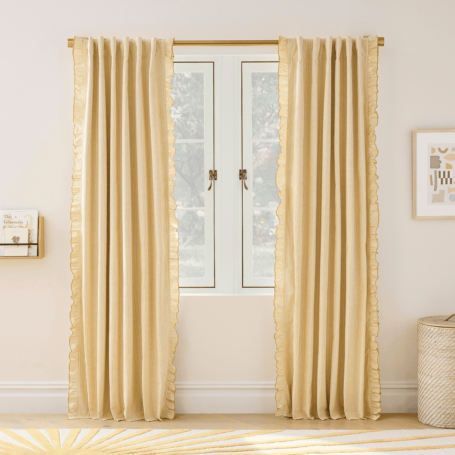 Window with pinstripe ruffle curtains, framed by simple decor