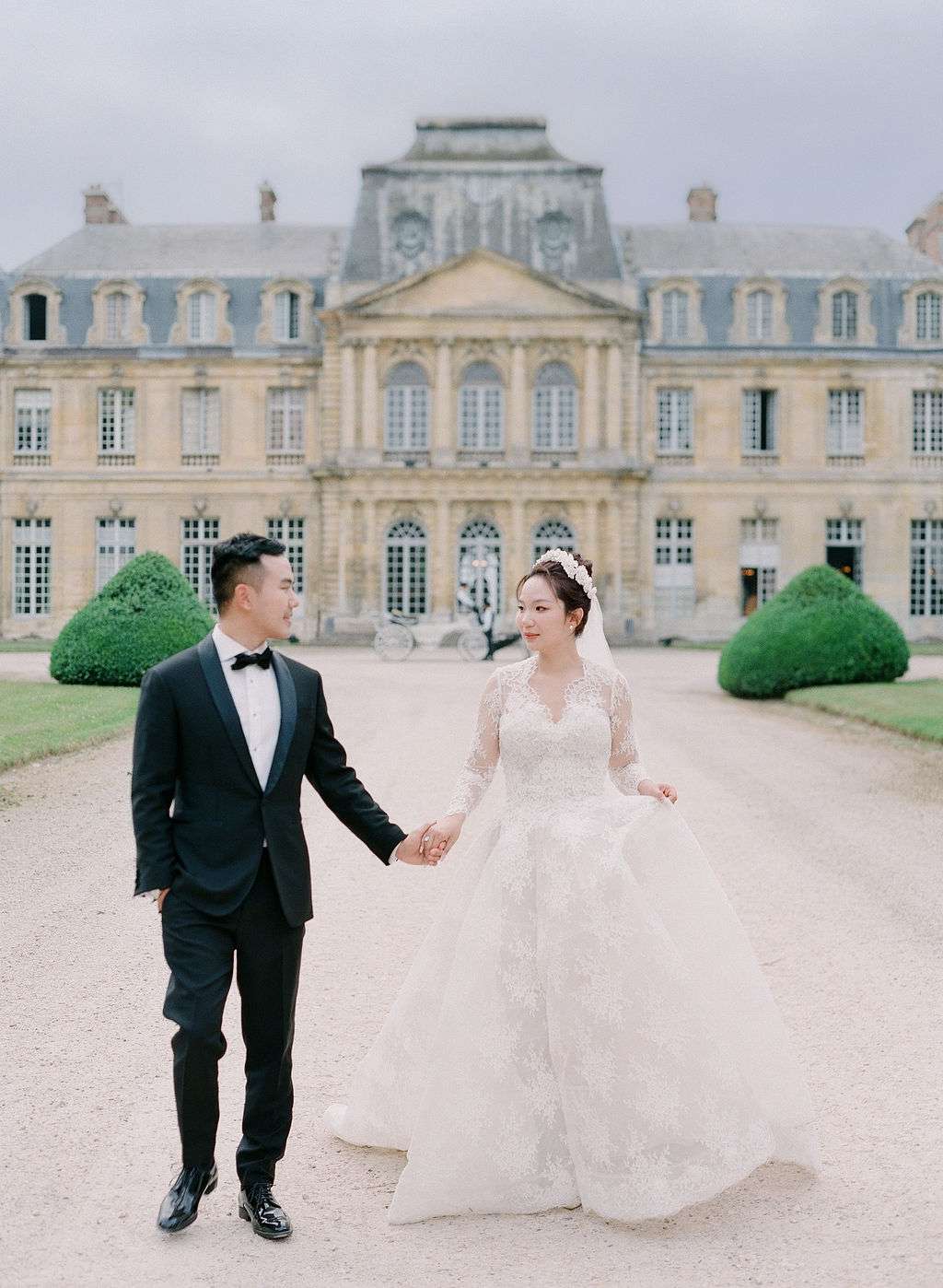 French chateau bride and groom portrait