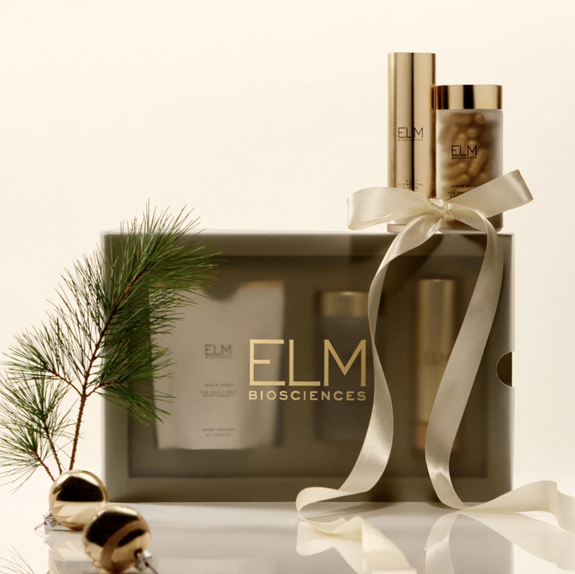 Gift set including ELM Biosciencesbranded products next to festive decorations