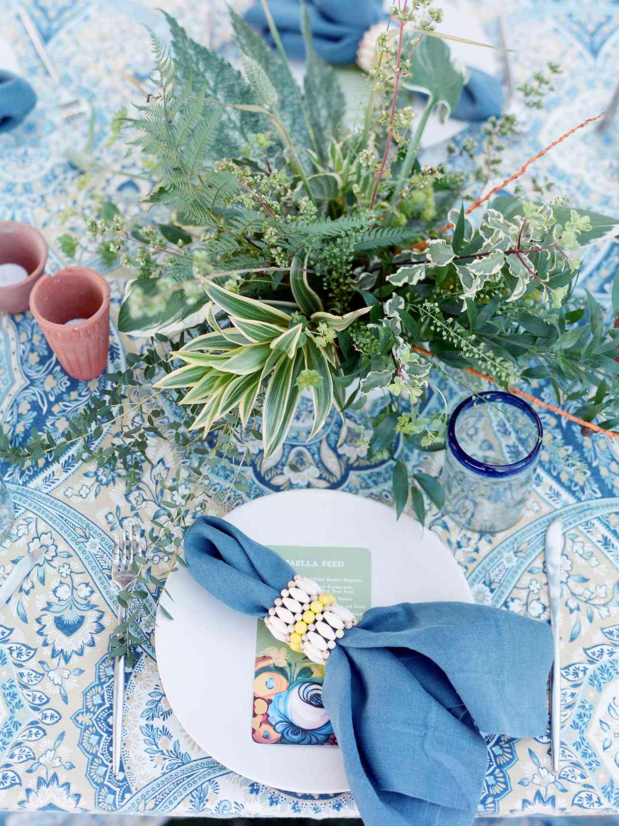 blue patterned table cloth with brunch setting