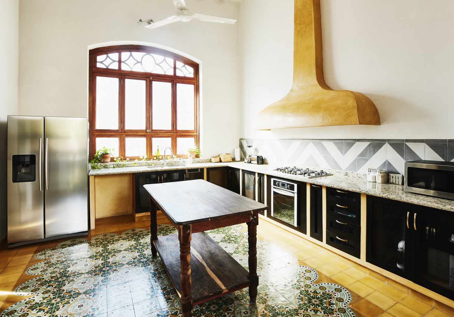 kitchen with patterned yellow and green flooring