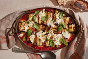 eggplant involtini with fresh tomato sauce topped with fresh basil leaves