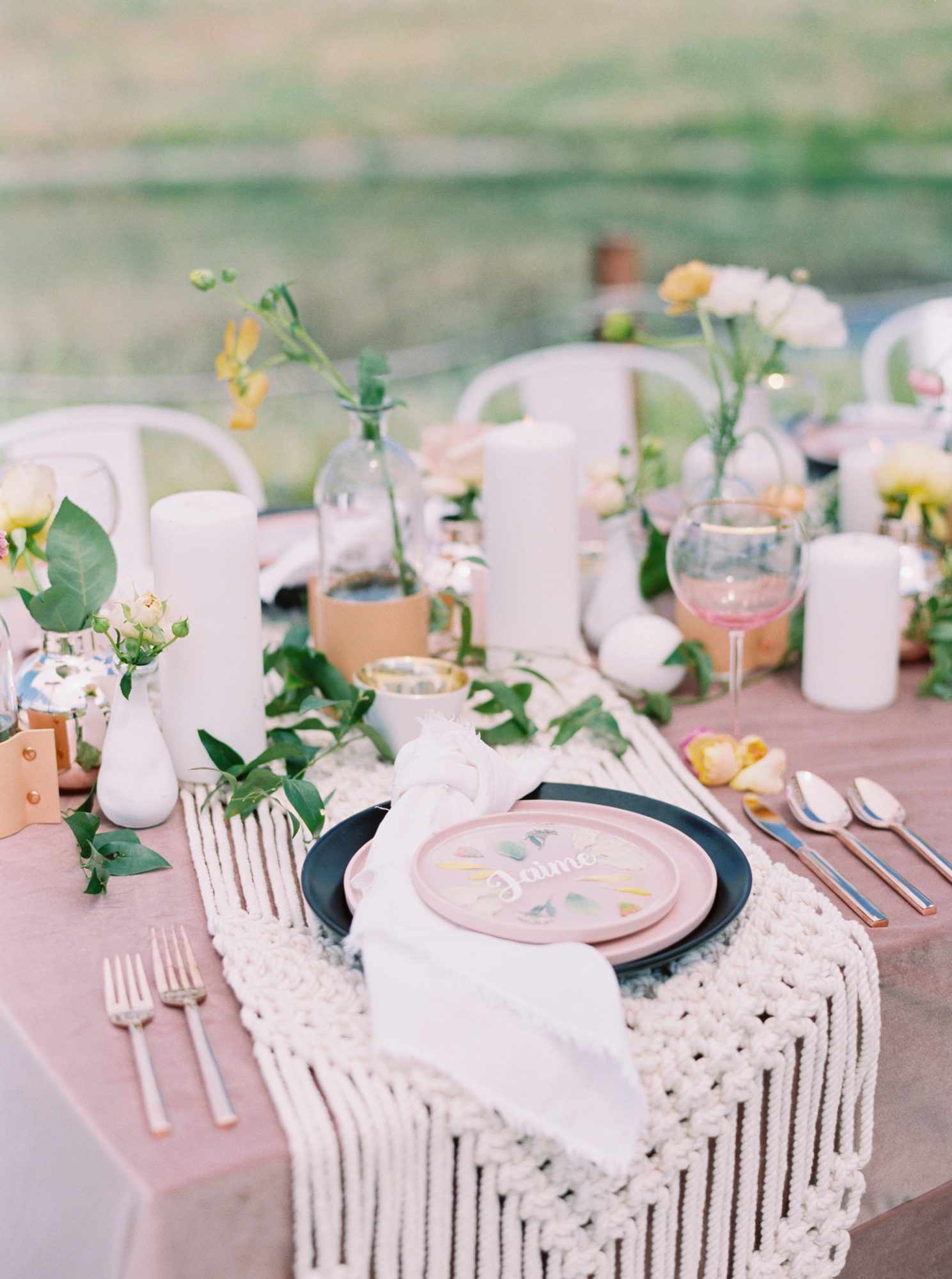 Cluster Centerpieces in Clear Vases on Boho Table