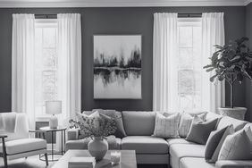 Minimalist transitional living room sectional sofa coffee table with decor artwork on wall
