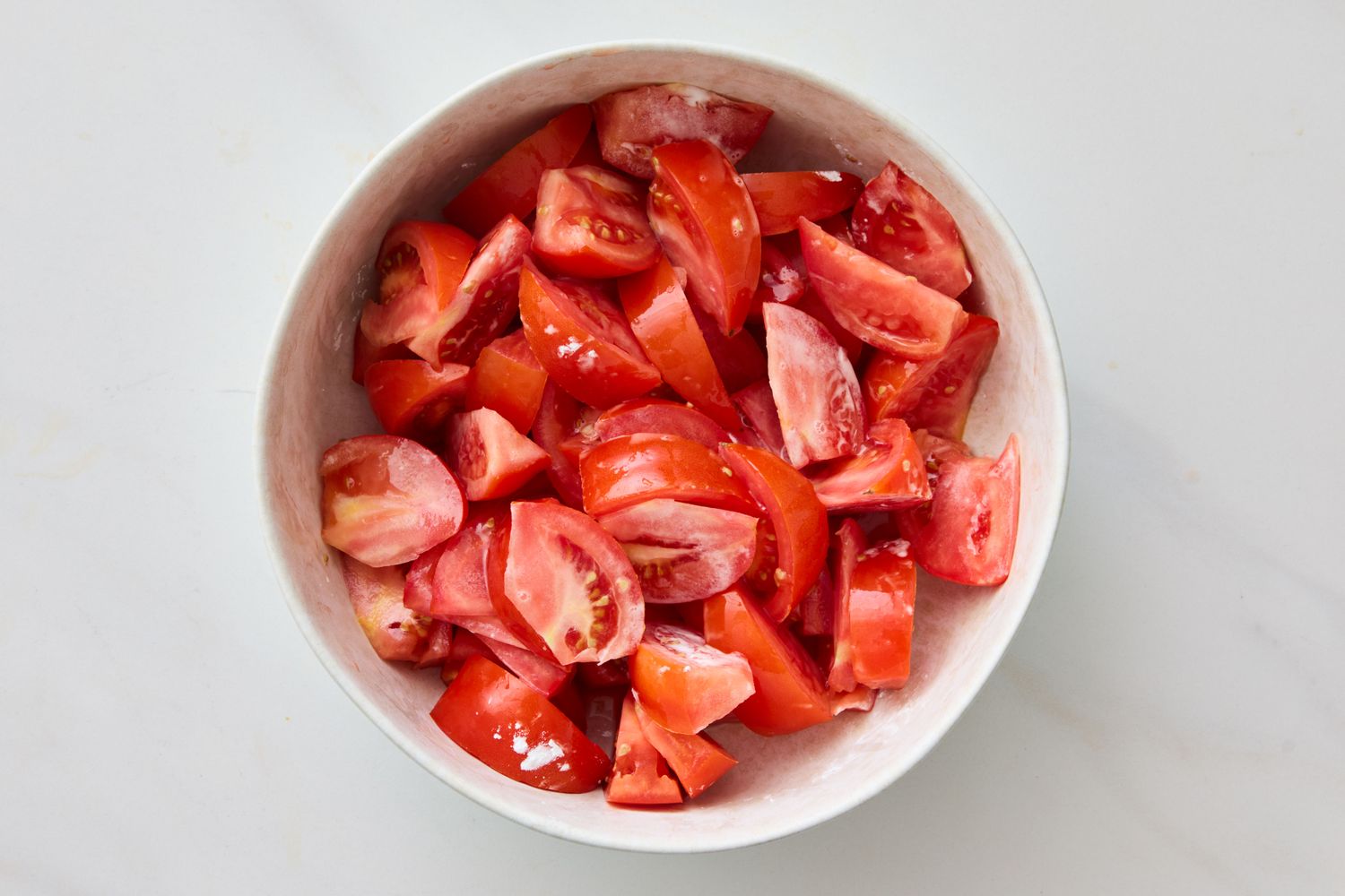 A bowl of chopped tomatoes