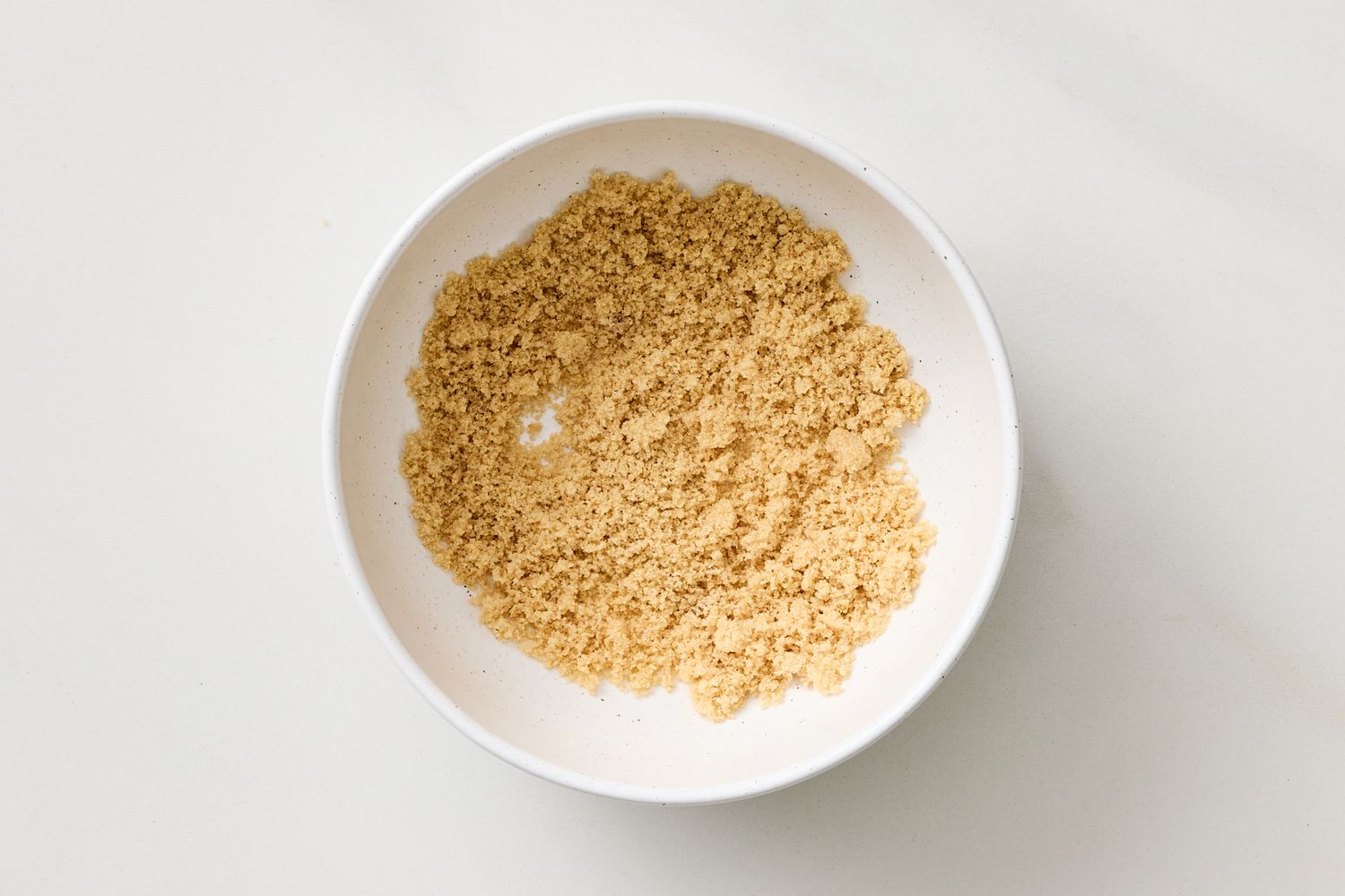 A bowl filled with brown sugar