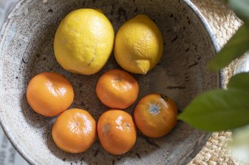 lemons and clementines in bowl