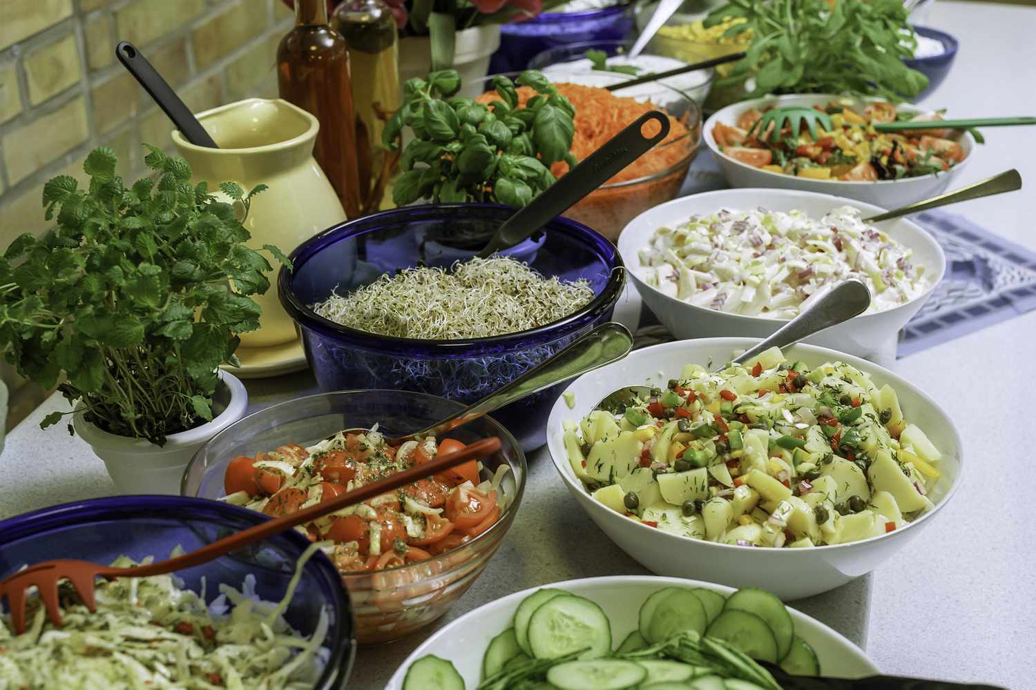outdoor buffet with vegetables and salads