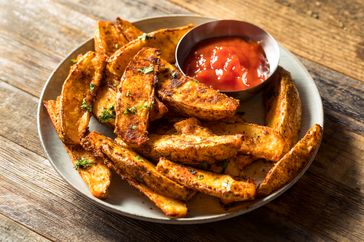 Homemade Spicy Oven Fried Potato Wedges with Ketchup