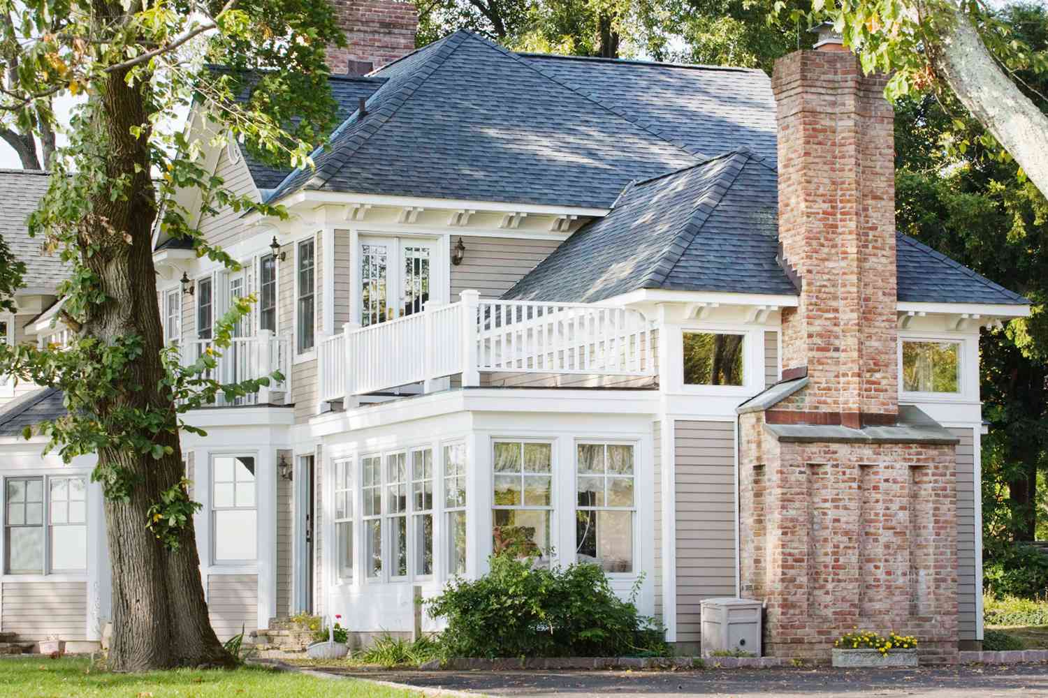 House exterior with widows walk
