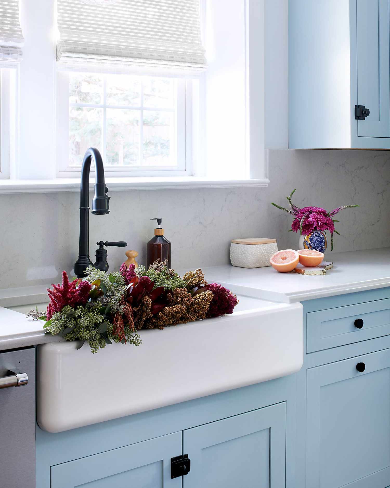 powder blue kitchen with view of sink details
