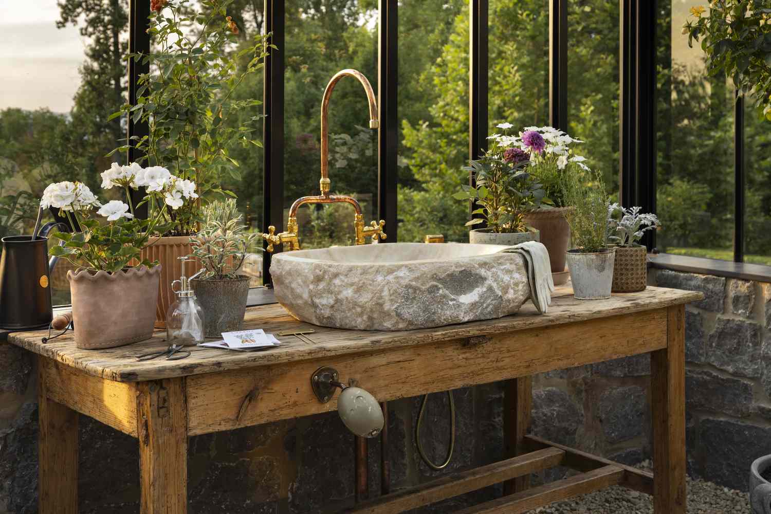 potting shed in a greenhouse with a sink
