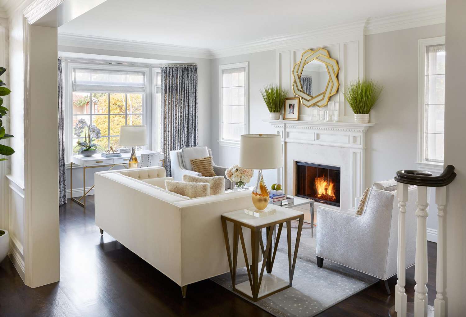 white living room color scheme with gold accents