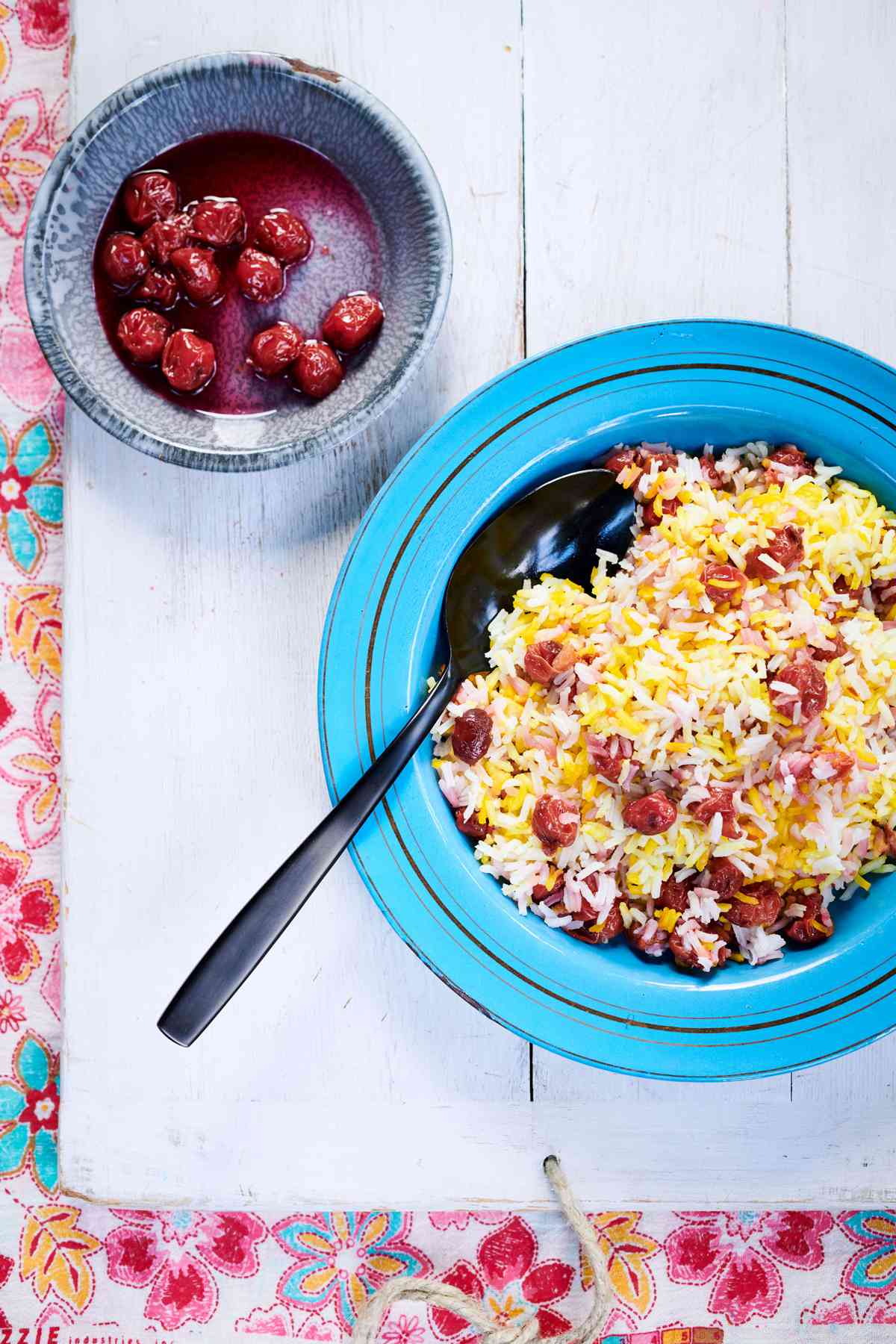 albaloo polo saffron-infused rice topped with preserved cherries