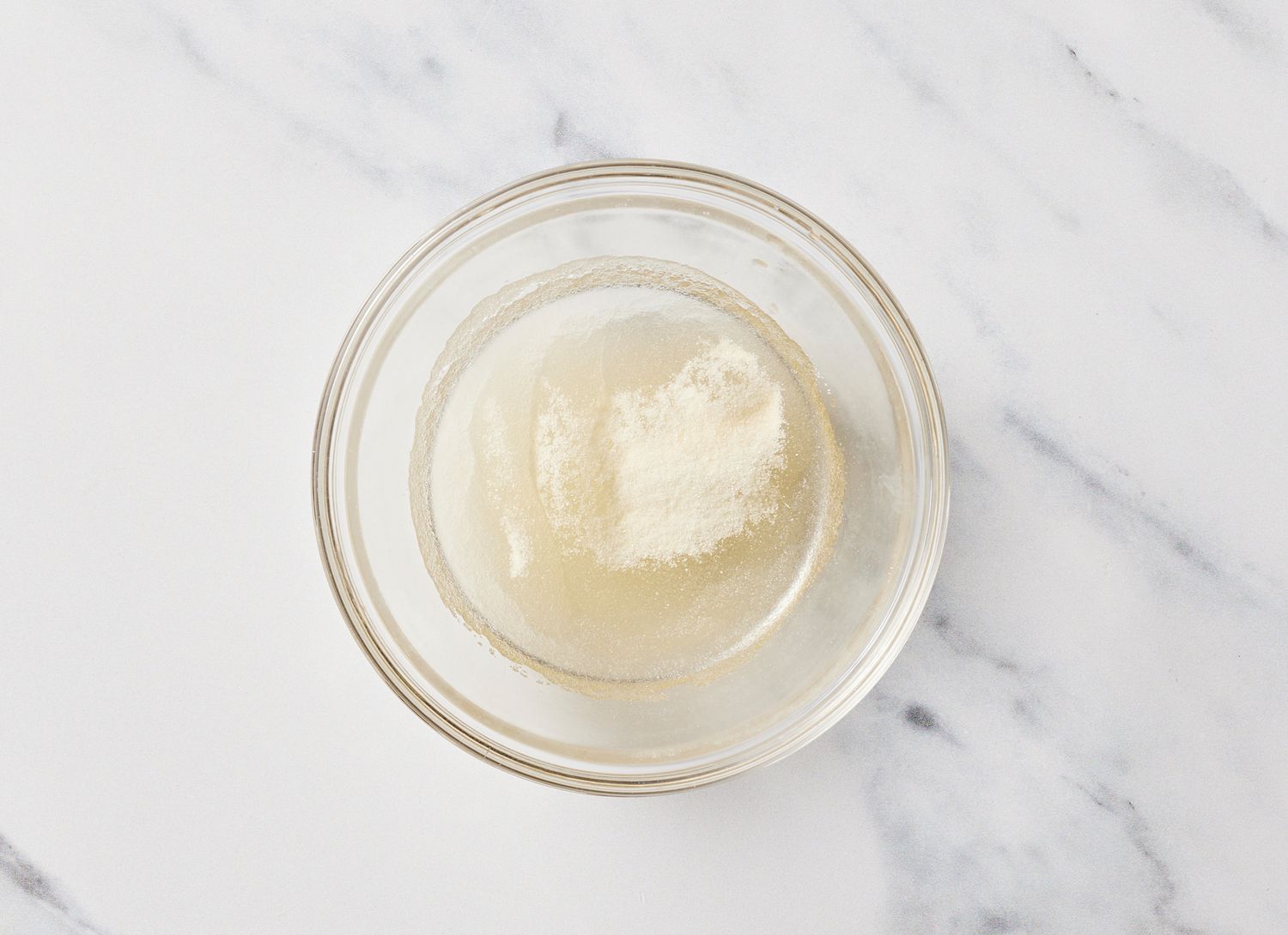 baking soda and other ingredients in a glass bowl
