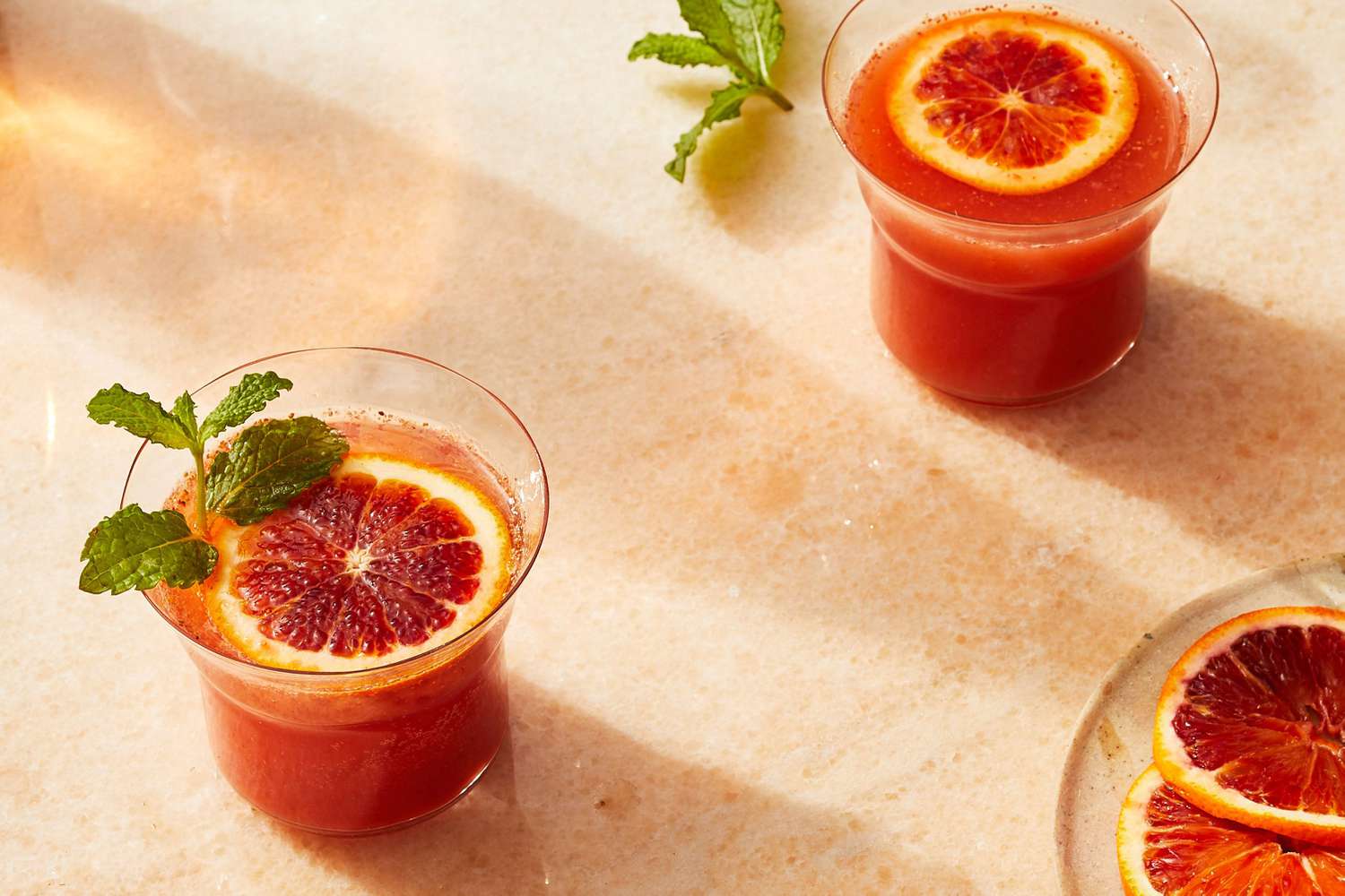 Sparkling strawberry cocktail with blood oranges