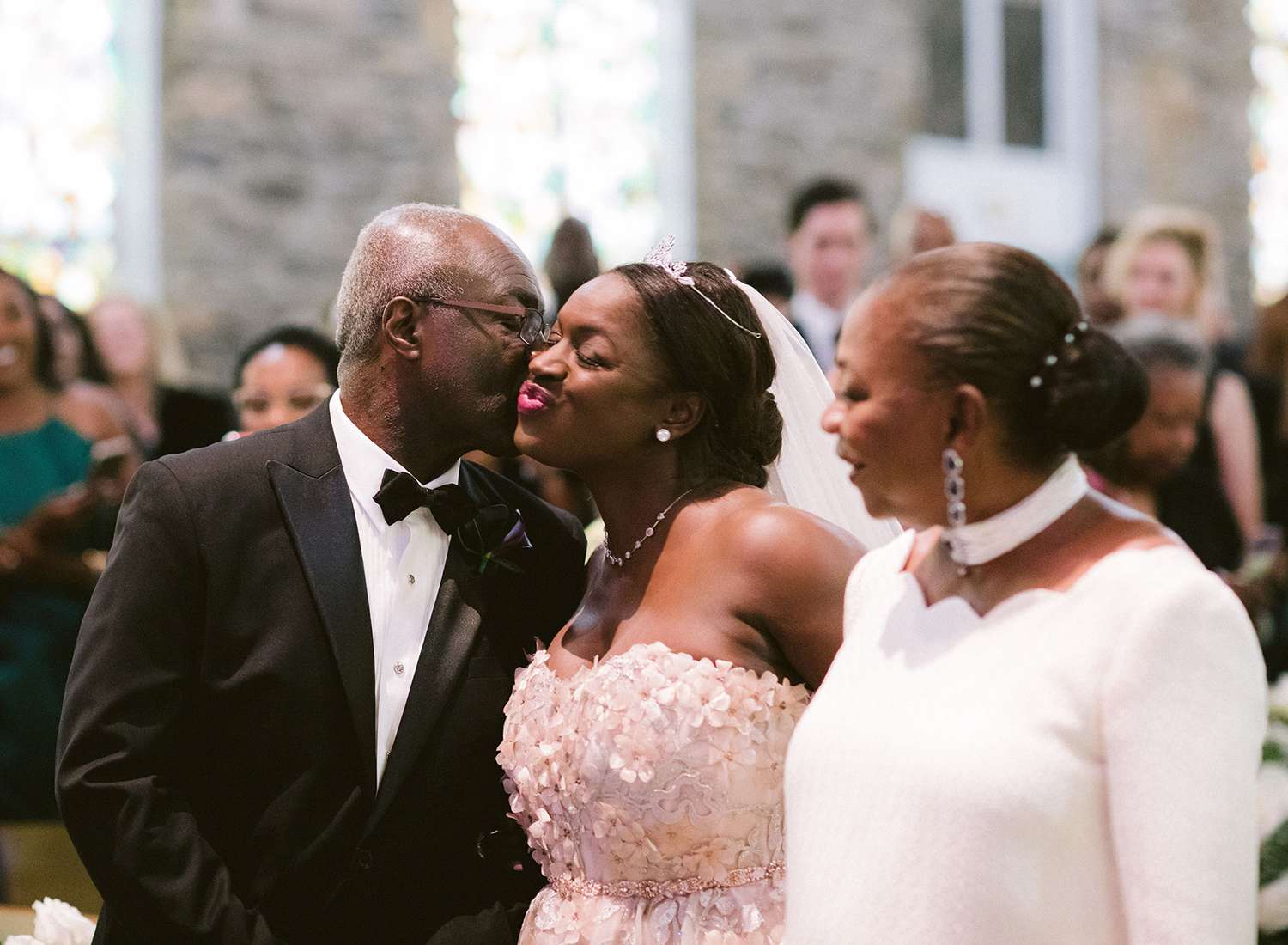 bride with parents at ceremony