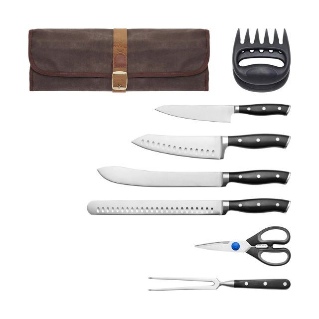 A set of kitchen knives utensils and a carrying case arranged together