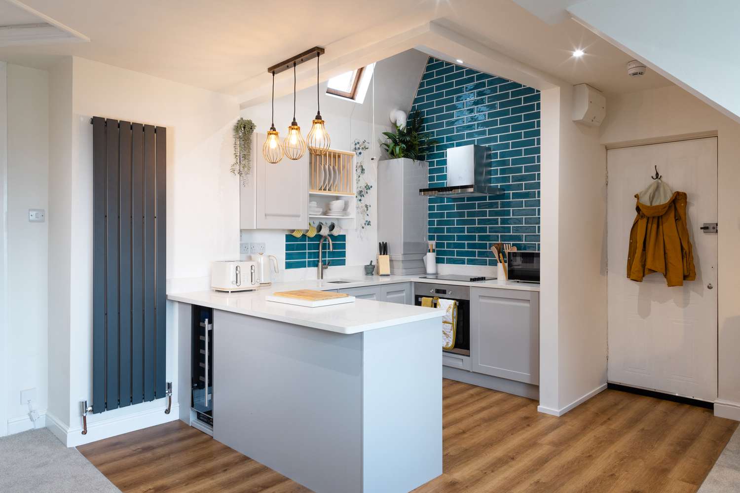 blue tile backsplash in small kitchen