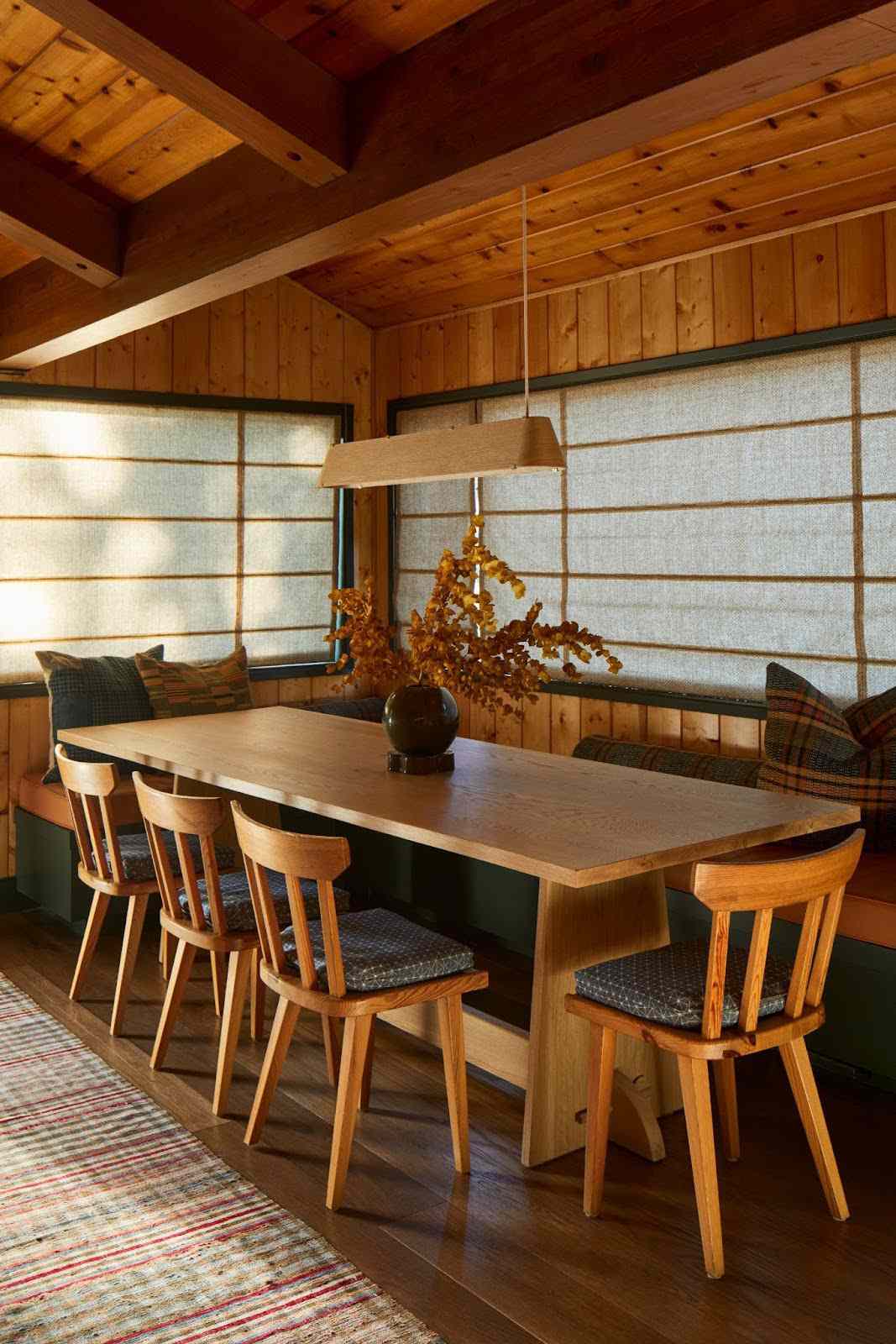 a kitchen with wood paneling