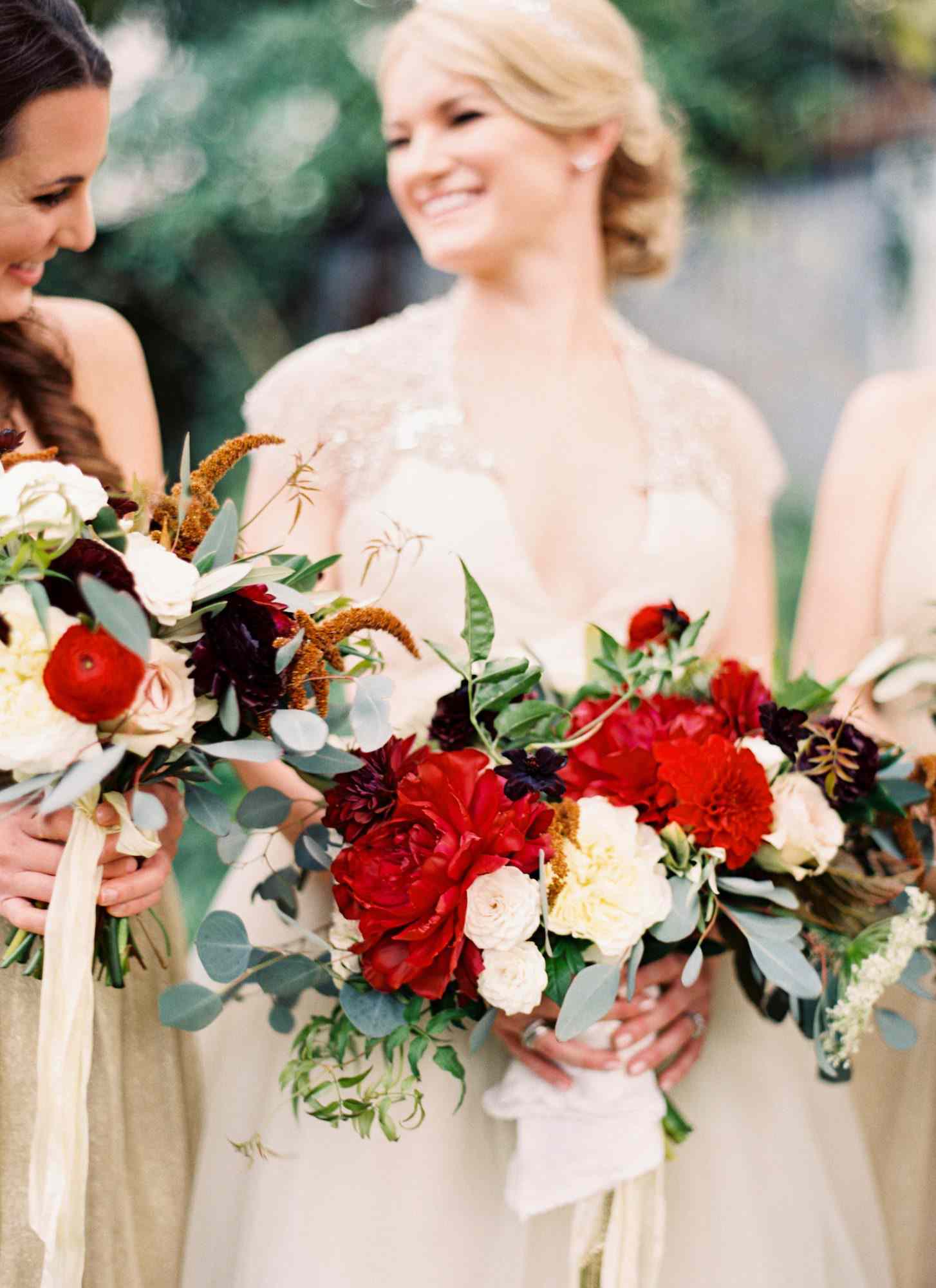 red bridesmaid bouquets