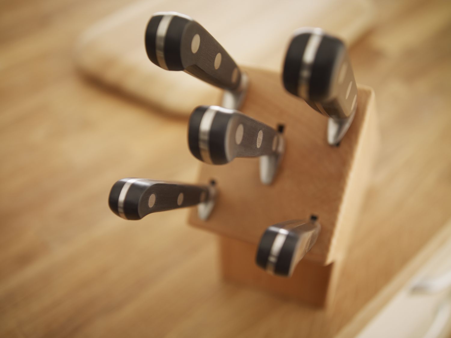 wooden knife block holding knives