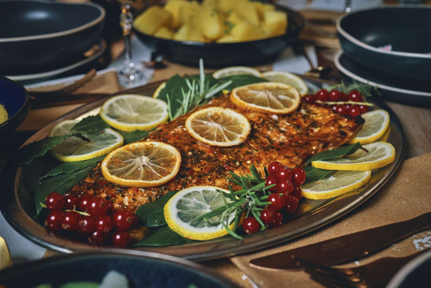 Christmas Dinner with Salmon Fish Fillet, Prepared Potato, Carrots, Peas, Polenta and Christmas Cake