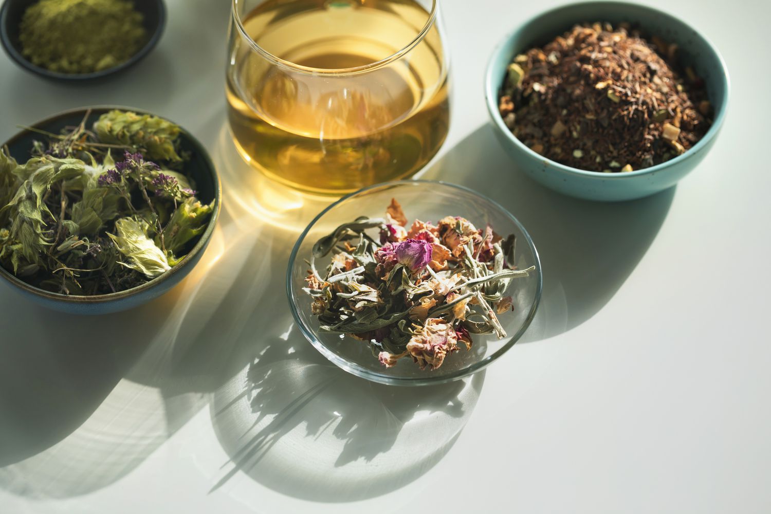 Herbal tea with dried tea leaves and flowers