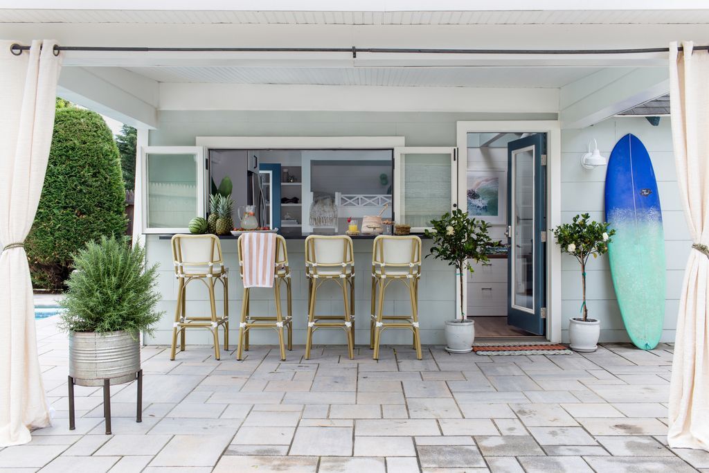 Pool house with drapes