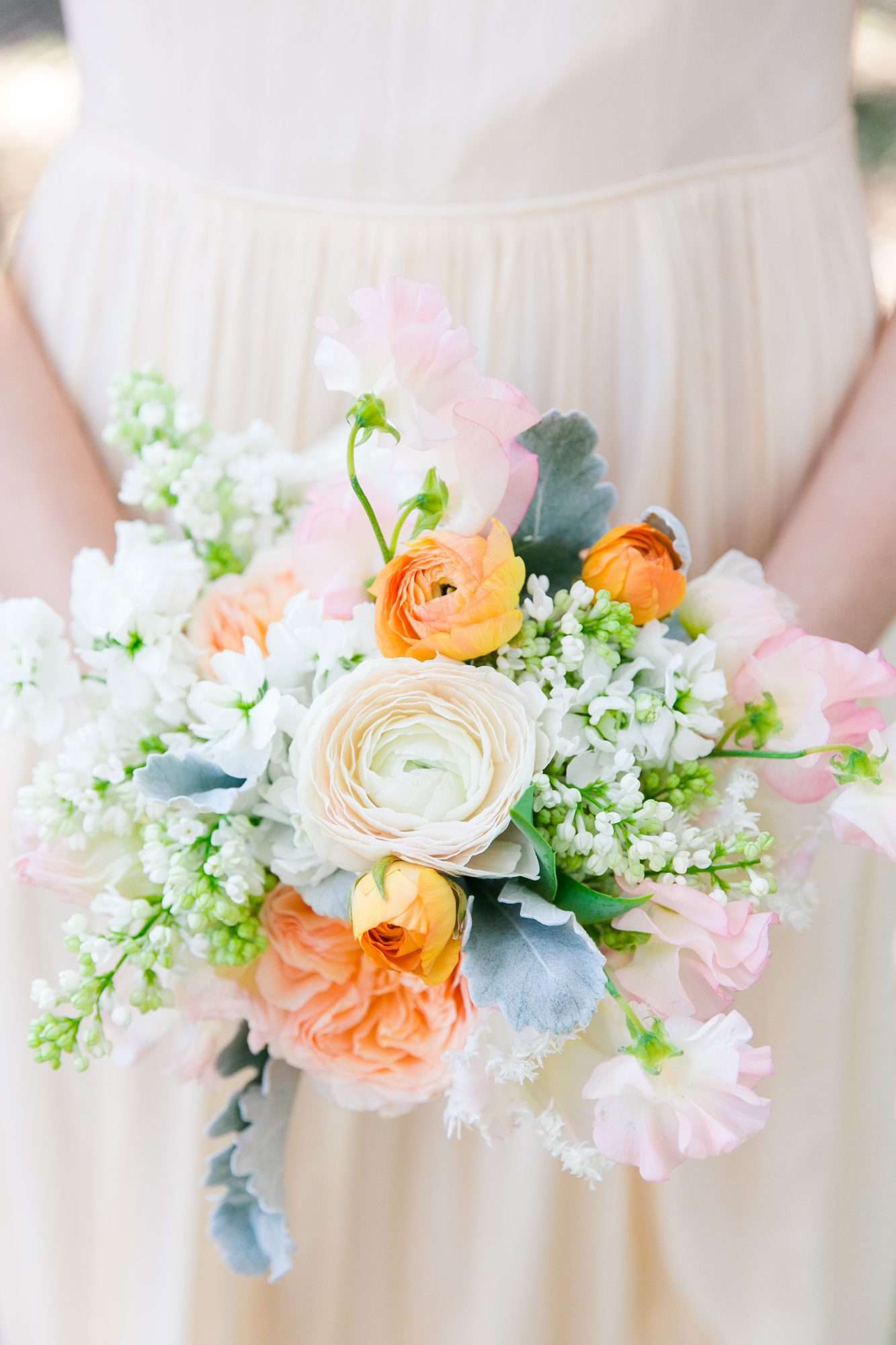 Muted Pastel Bouquet with Ranunculus, Sweet Peas, and Dusty Miller