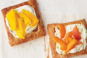 close up of two puff pastries on a white background