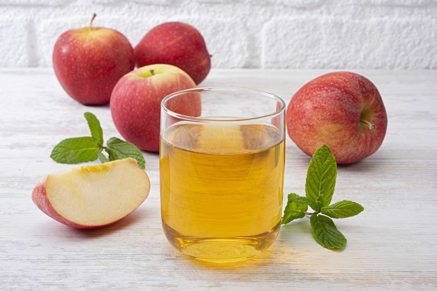 Apple juice in glass cup 