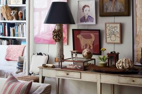 collection of wall art featuring different subjects, shapes, and sizes