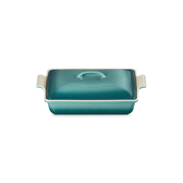 A rectangular lidded baking dish with side handles