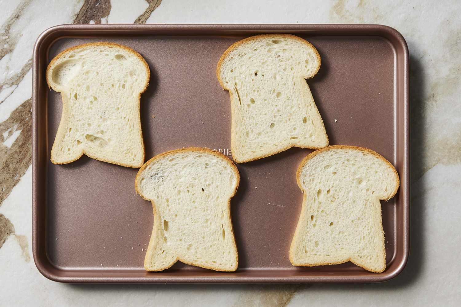 Croque Madame bread on baking sheet