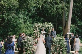 bride walking processional with dad