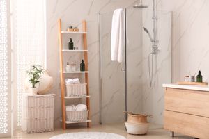 glass shower in modern marble bathroom