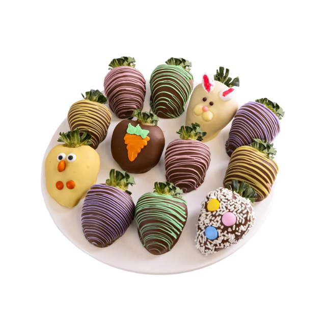 Plate of strawberries decorated with chocolate and festive patterns