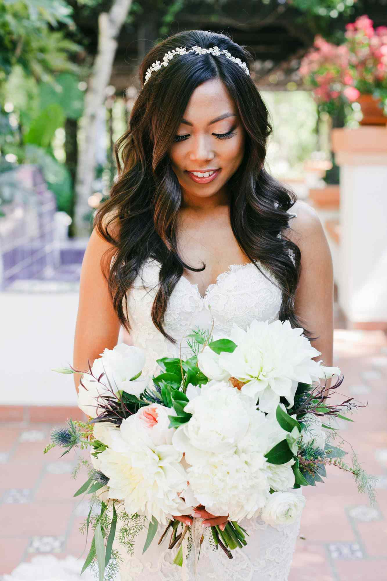 bride with dahlia bouquet white flowers green