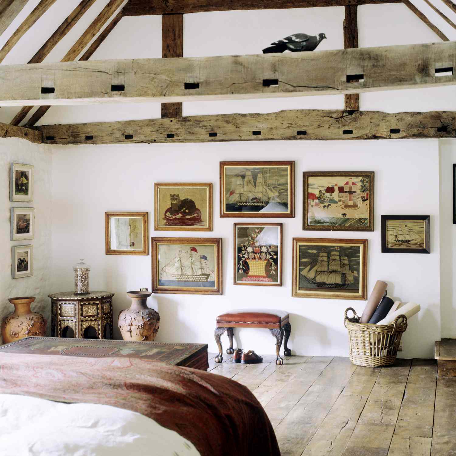 bedroom with artwork on wall