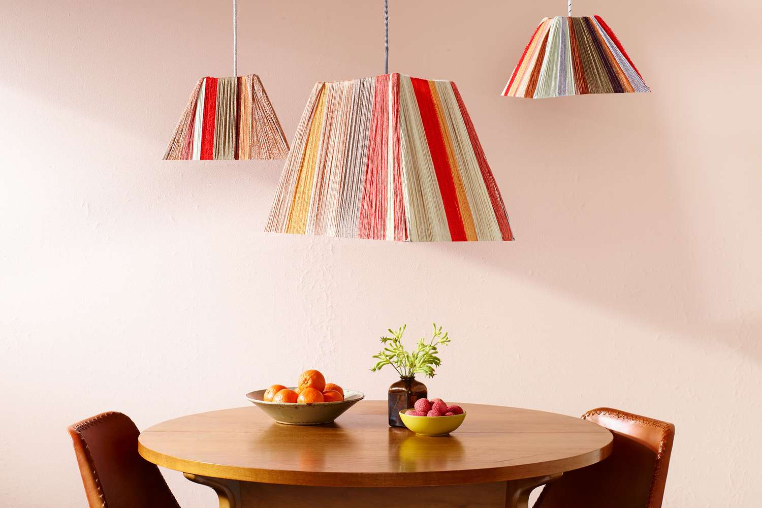 Dining room with colorful lighting fixtures