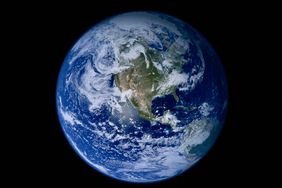 View of Earth from space showing North America oceans and cloud patterns