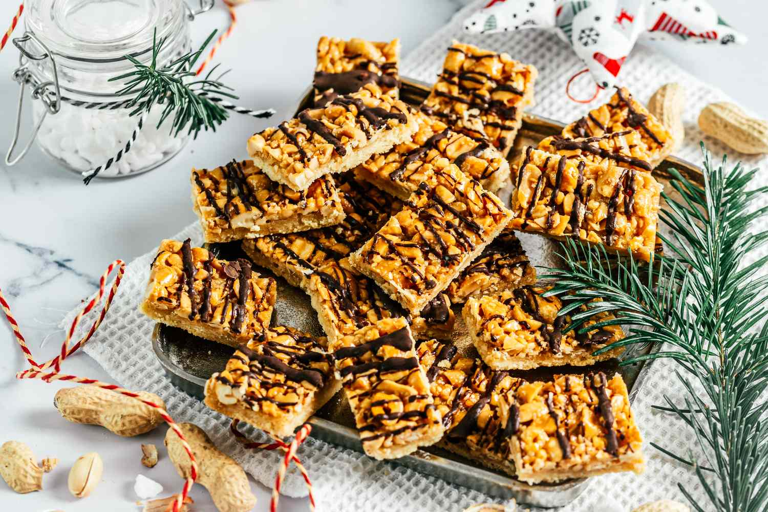 Homemade peanut caramel cookies, Christmas cookies with salted caramel and peanuts, cut into rectangles